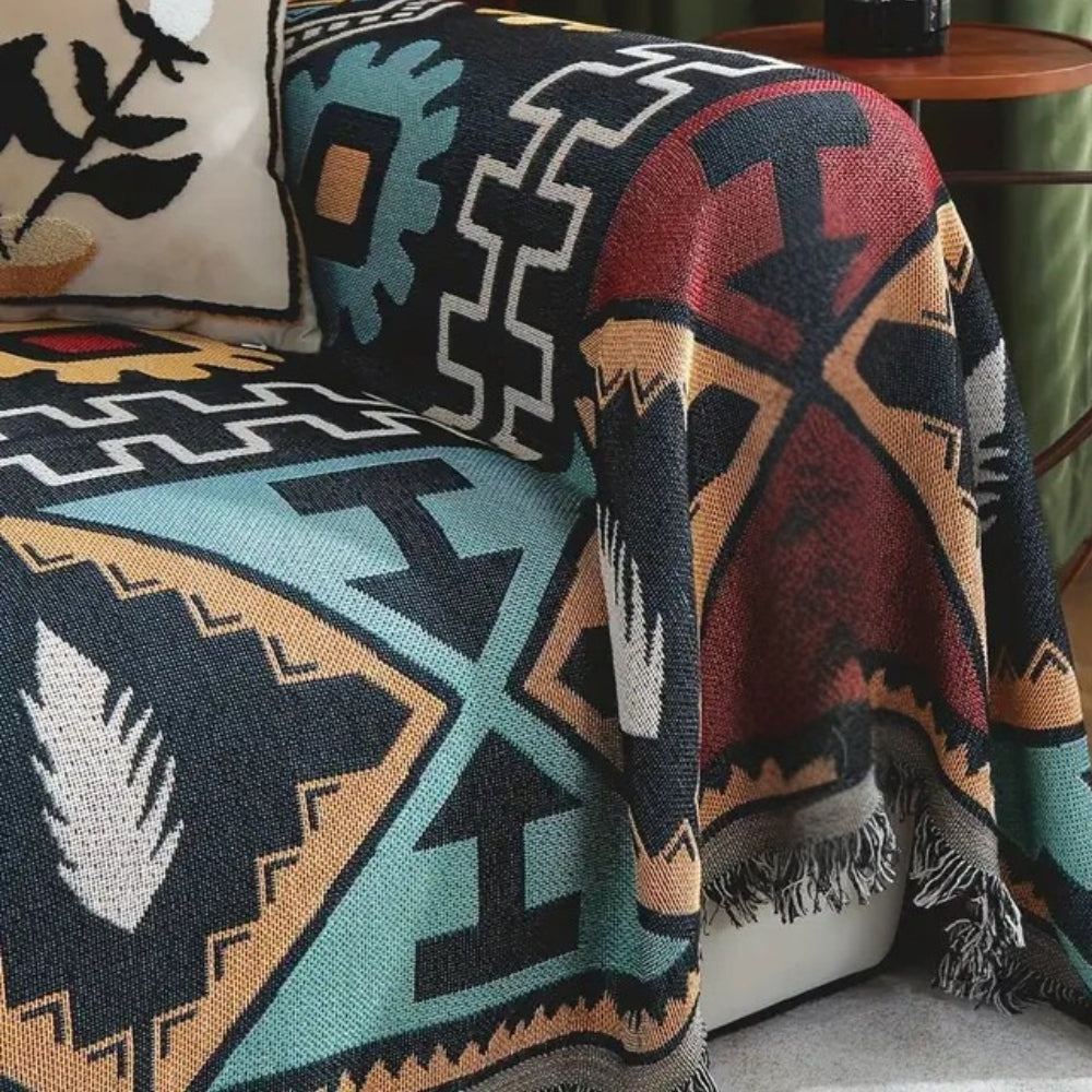 Sofaüberwurf mit Aztekenmuster und Quasten