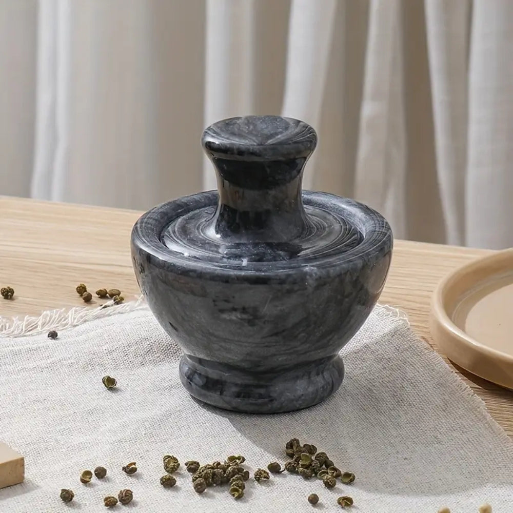 Mortier et pilon en marbre