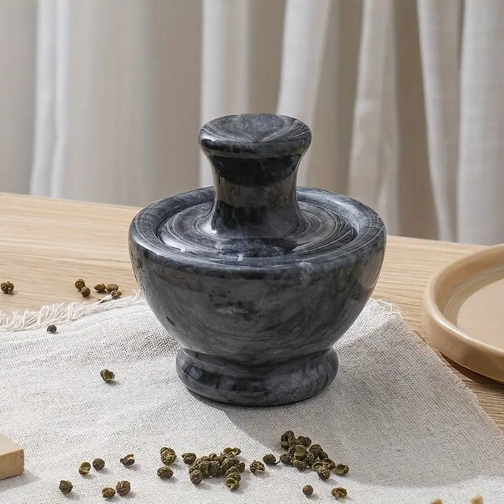 Mortier et pilon en marbre