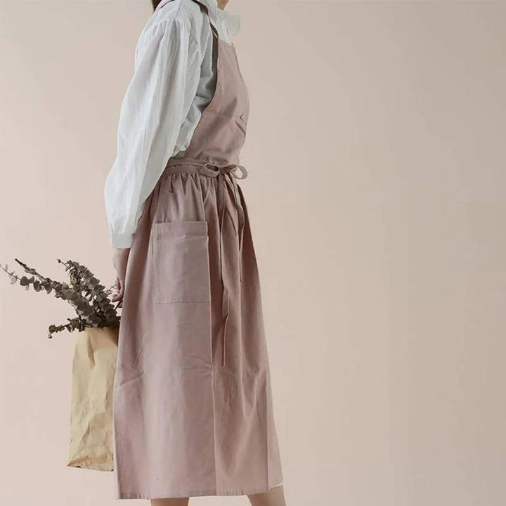 Baumwollschürze mit überkreuzten Trägern und Taschen