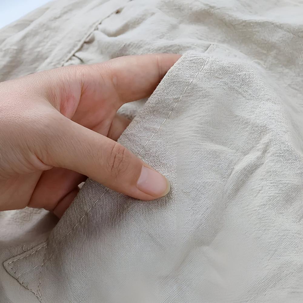 Tablier en mélange de coton à volants et poche