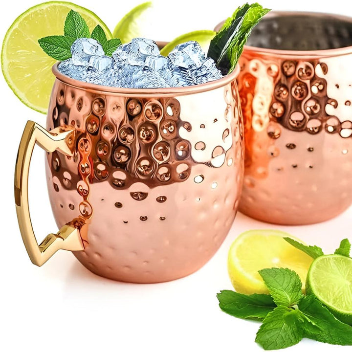 Mug en cuivre martelé à anse en laiton