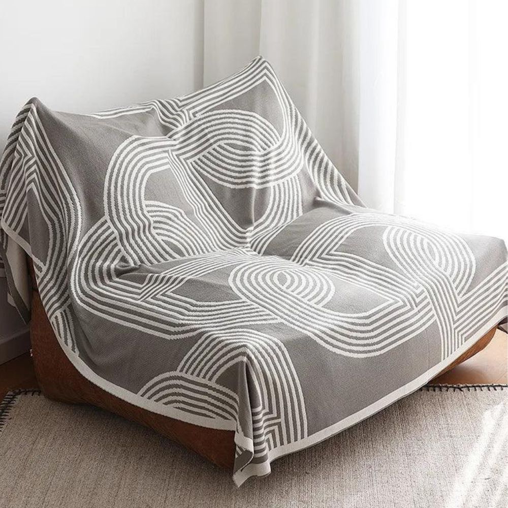 Reversible Strickdecke mit Labyrinthmuster