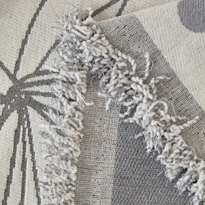 Wendbare Chenille-Sofadecke mit Blumenmuster und Quasten