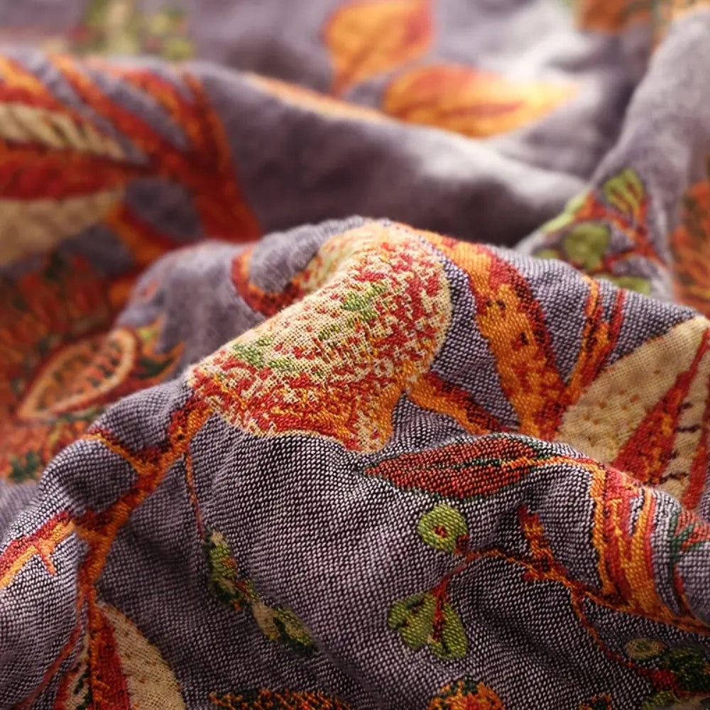 Wendbare Tagesdecke aus floralem Baumwoll-Jacquard mit Quasten