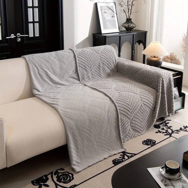 Sofaüberwurf Fleece Fischgrät Blattmotiv