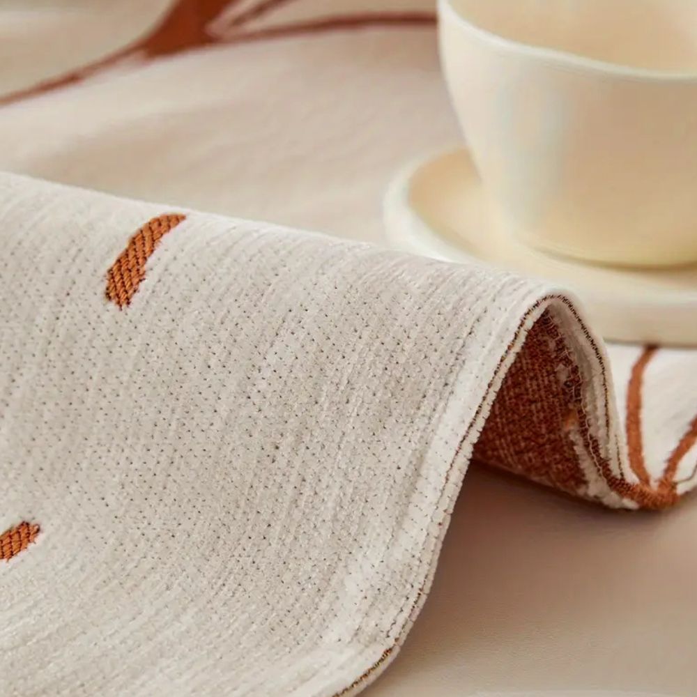 Wendbare Chenille-Sofadecke mit Blumenmuster und Quasten