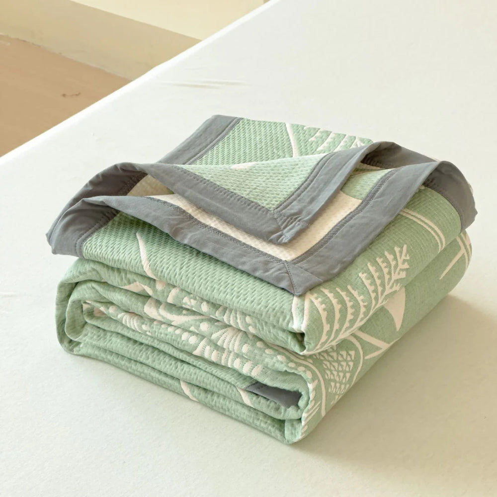 Wendbare Tagesdecke aus Baumwollmusselin mit Blumenmuster