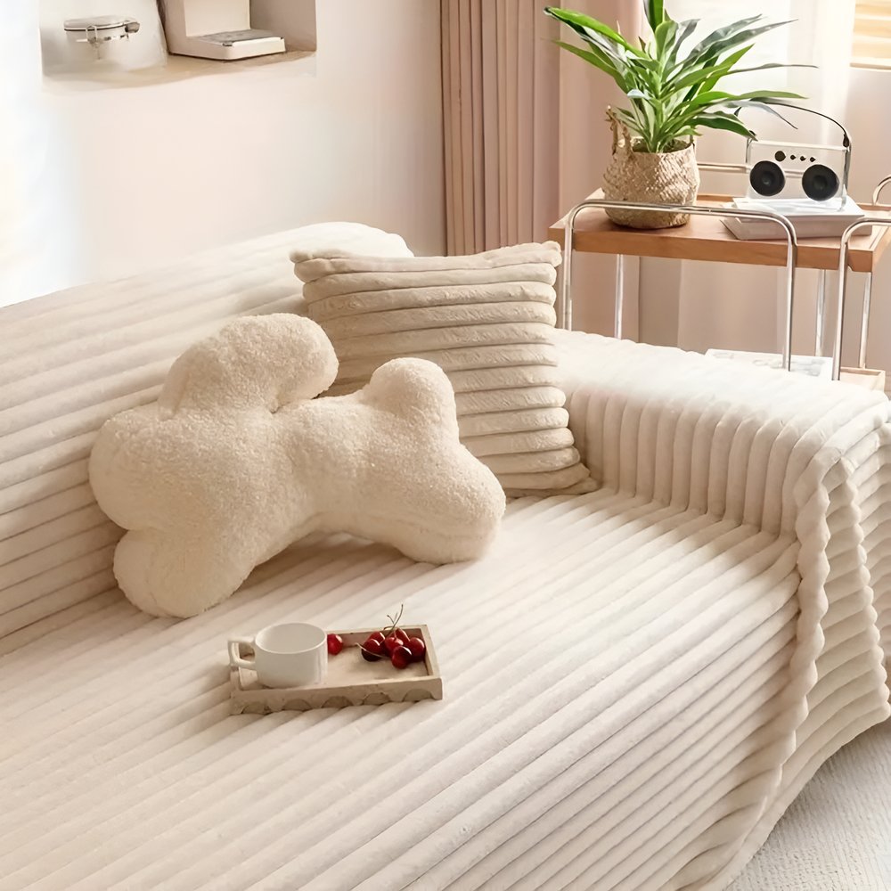 Gerippter, gesteppter Sofaüberwurf aus Plüsch
