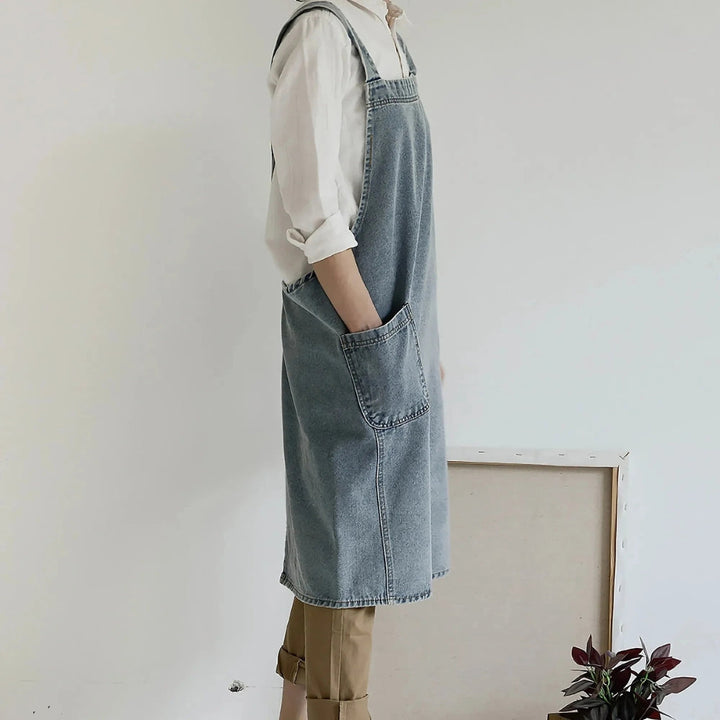 Tablier en denim de coton à poches