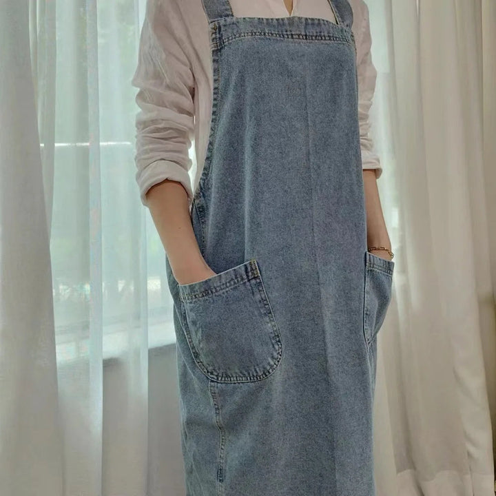 Tablier en denim de coton à poches