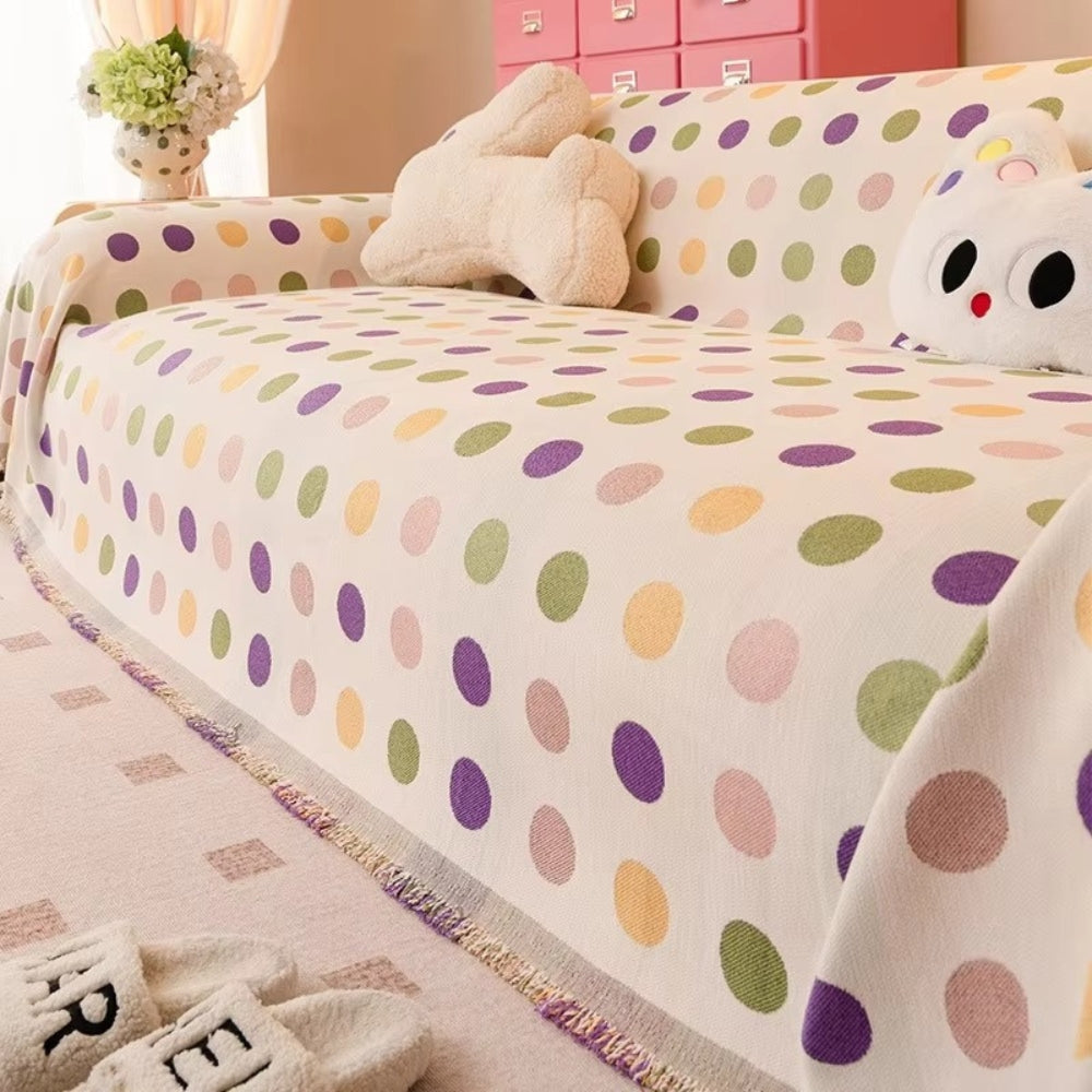 Sofaüberwurf mit Punktmuster