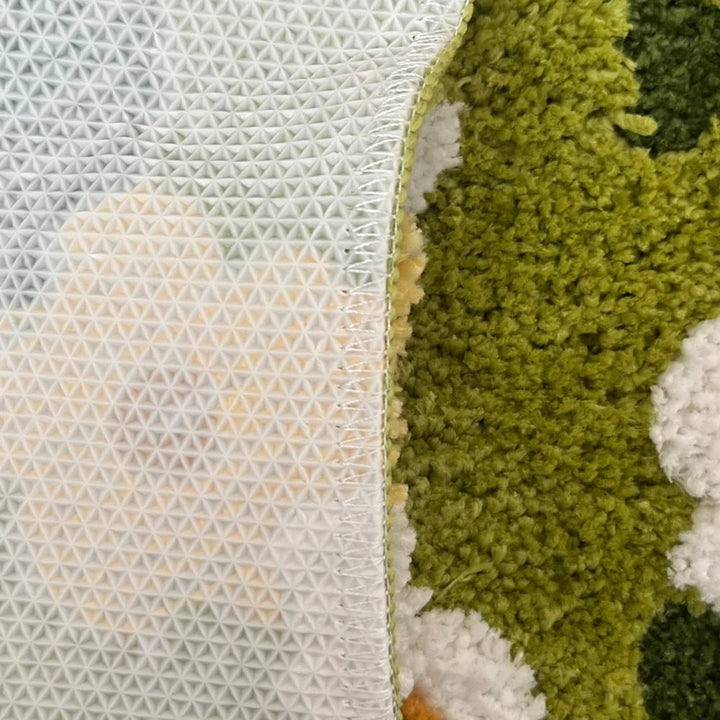 Badematte Moosoptik mit Gänseblümchen
