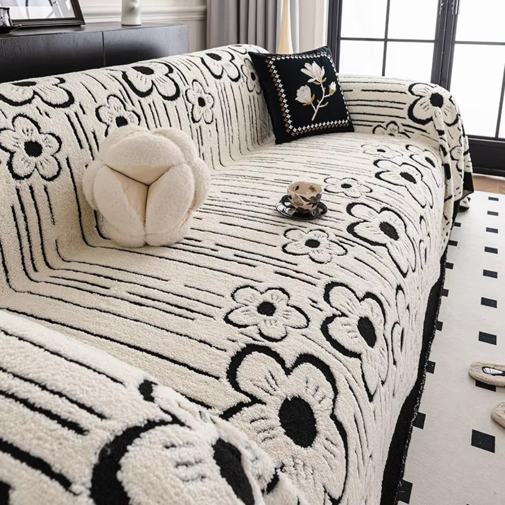 Sofaüberwurf mit Blumenstickerei