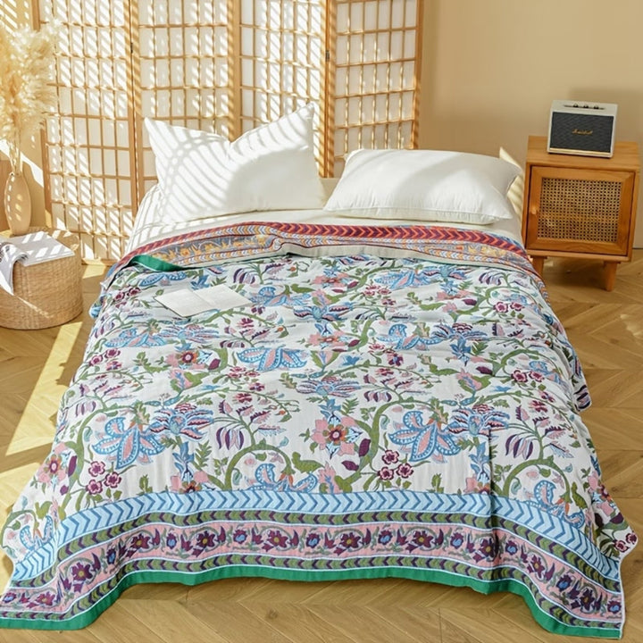 Wendbare Tagesdecke aus Baumwolle mit blau-weißem Blumen-Jacquard