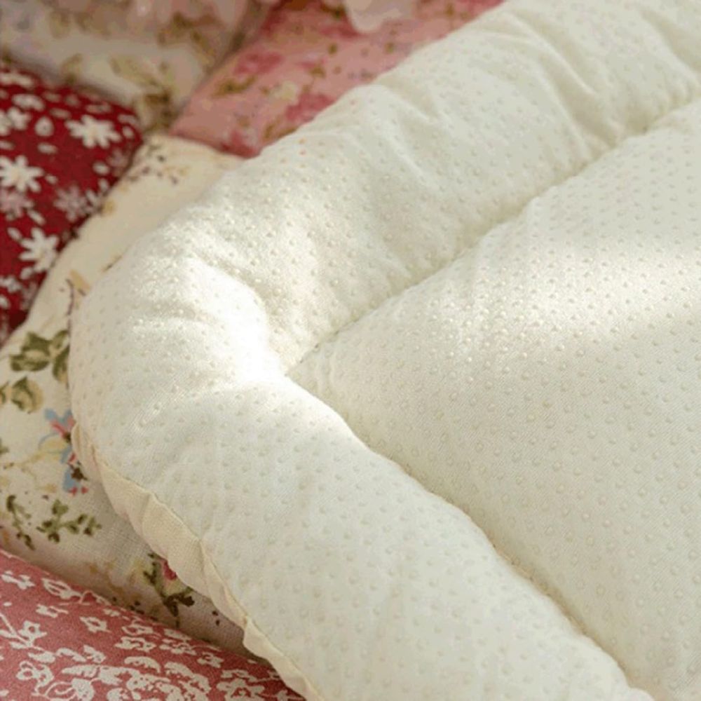 Sofaauflage gesteppt Blütenmuster
