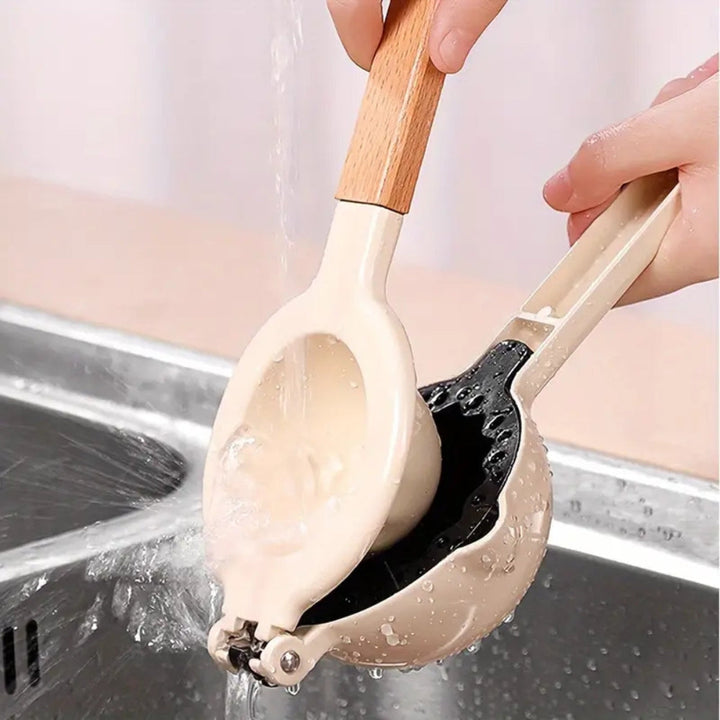 Zitruspresse Edelstahl mit Holzgriff
