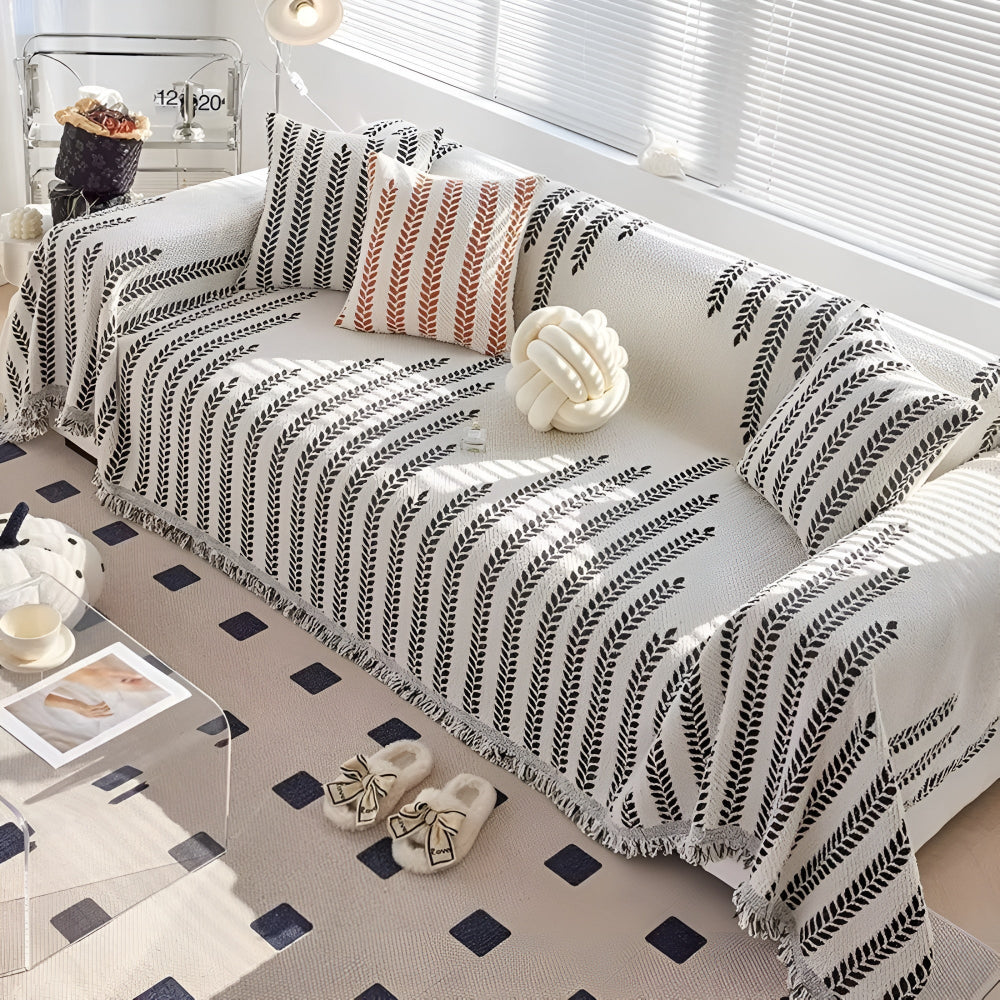 Sofaüberwurf Blattmotiv mit Fransenkante