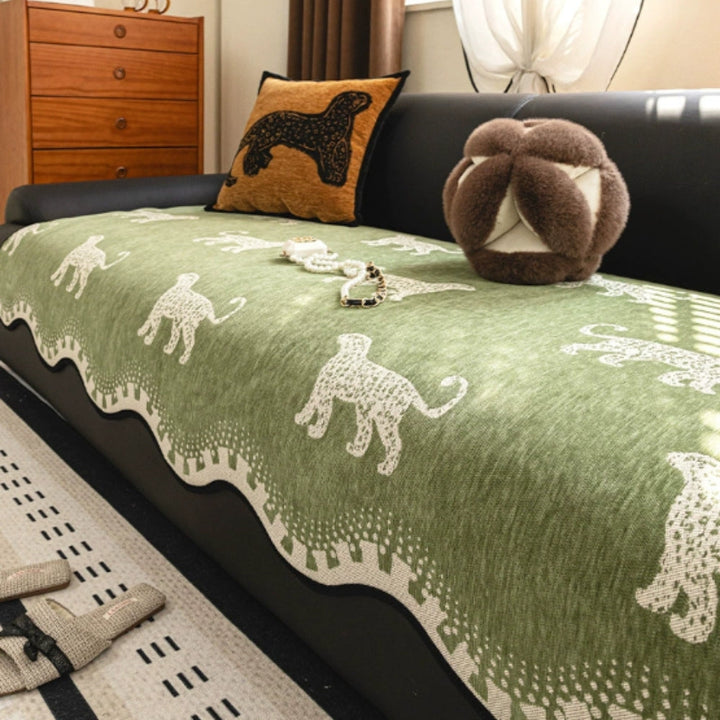 Sofaüberwurf Löwenmotiv mit Wellenkante