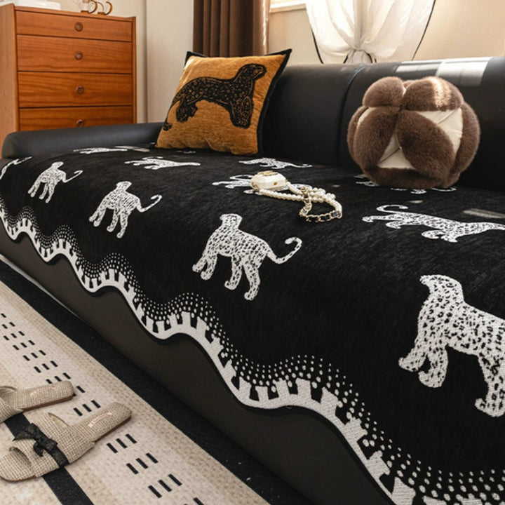 Sofaüberwurf Löwenmotiv mit Wellenkante