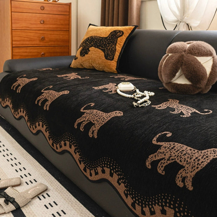 Sofaüberwurf Löwenmotiv mit Wellenkante