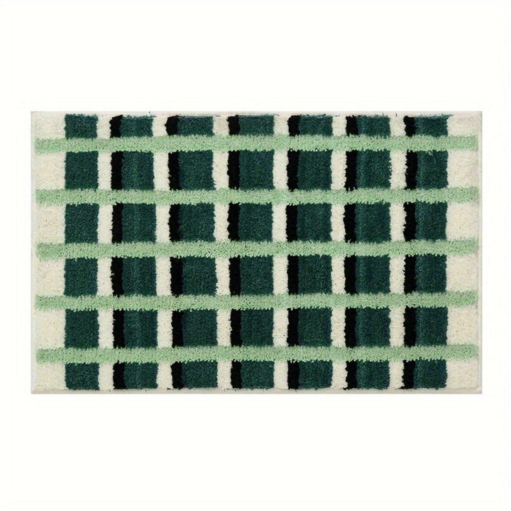 Tapis de bain géométrique vert mousse
