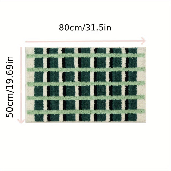 Tapis de bain géométrique vert mousse