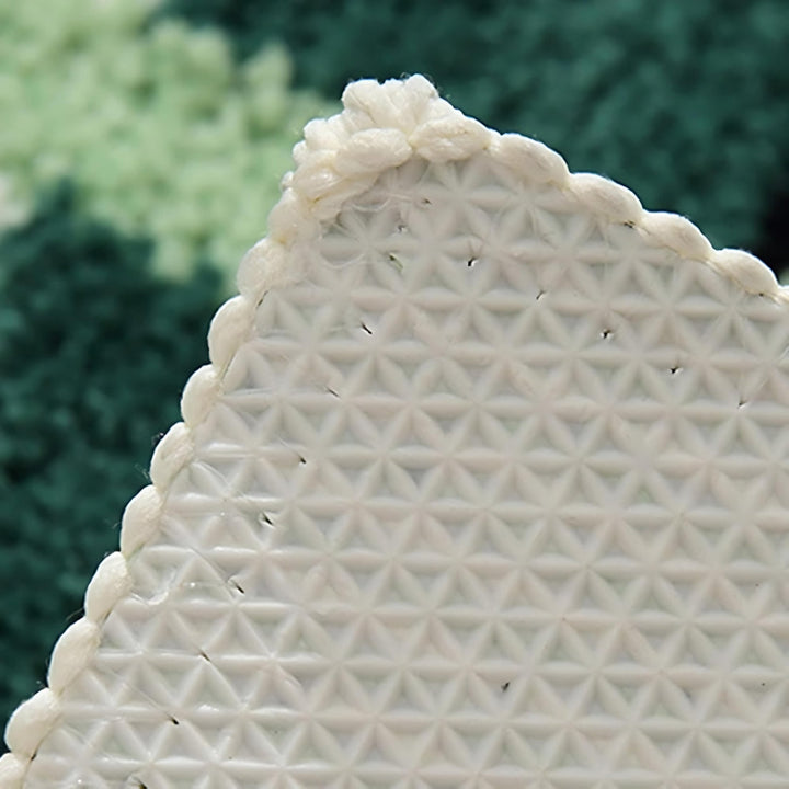 Tapis de bain géométrique vert mousse