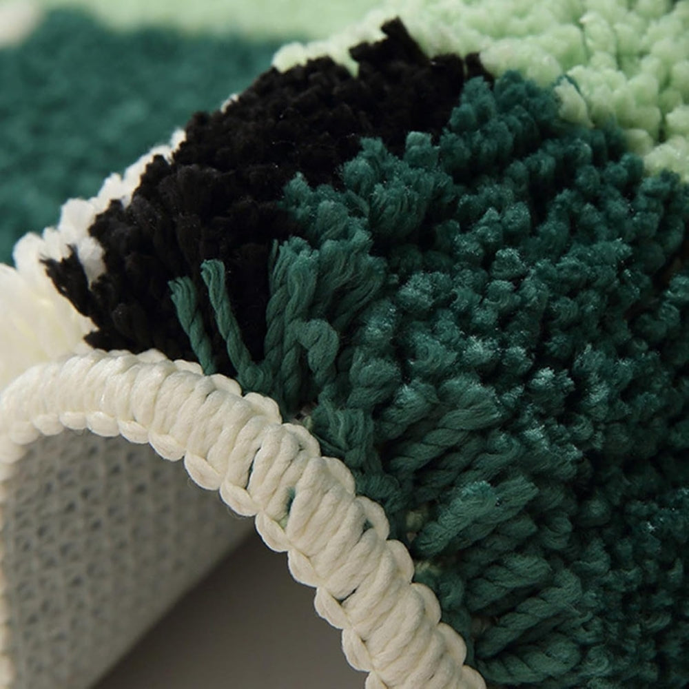 Tapis de bain géométrique vert mousse