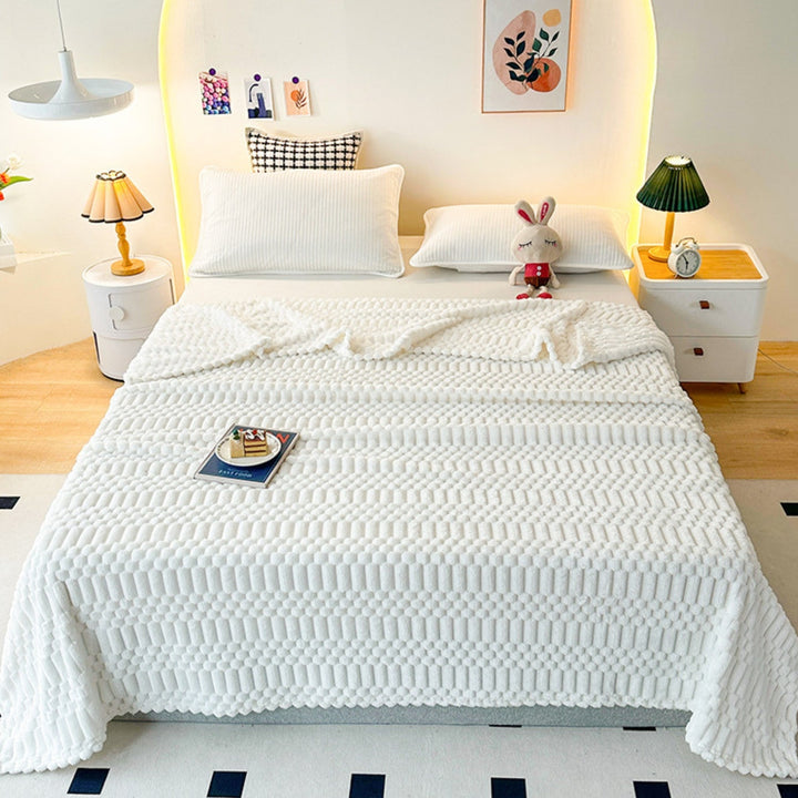 Plaid à motif en relief