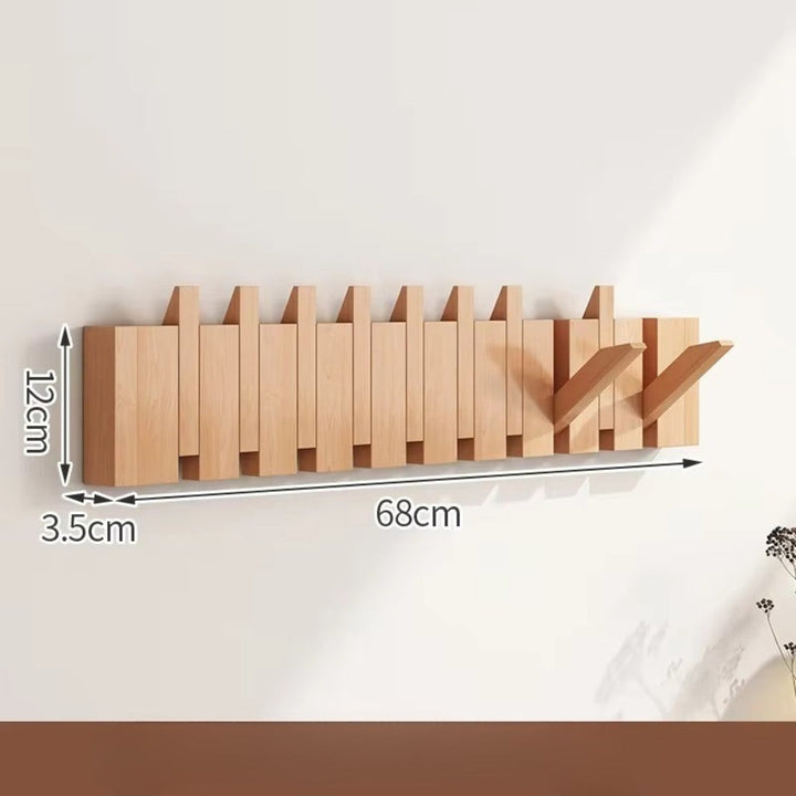 Patère murale rabattable, effet touches de piano