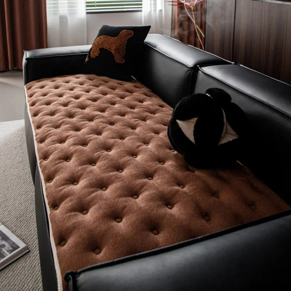 Sofaüberwurf mit Knopfsteppung
