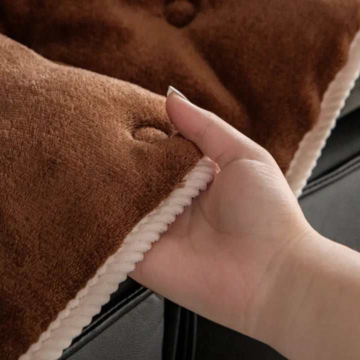 Sofaüberwurf mit Knopfsteppung