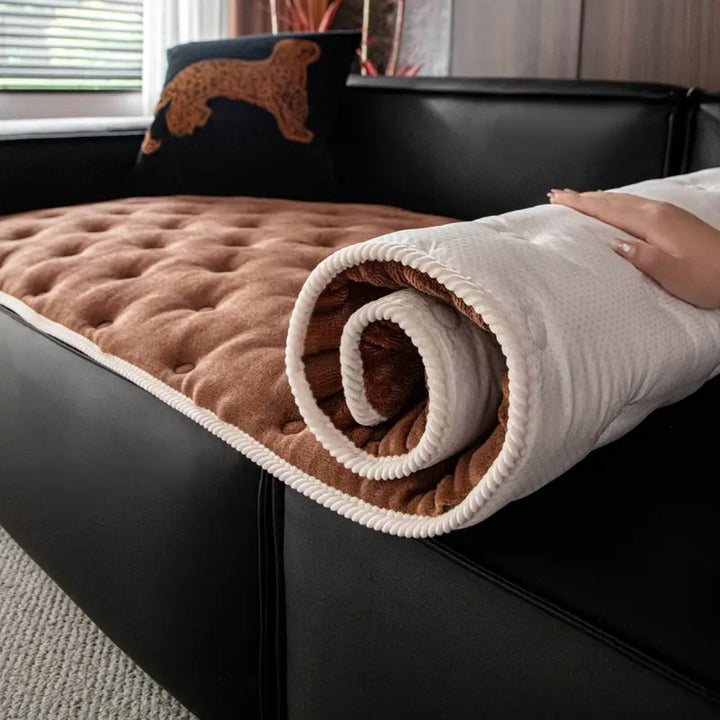 Sofaüberwurf mit Knopfsteppung