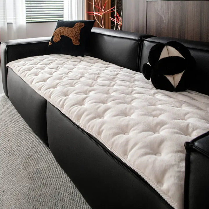 Sofaüberwurf mit Knopfsteppung