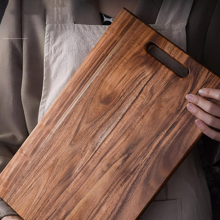 Planche à découper en bois massif à poignée
