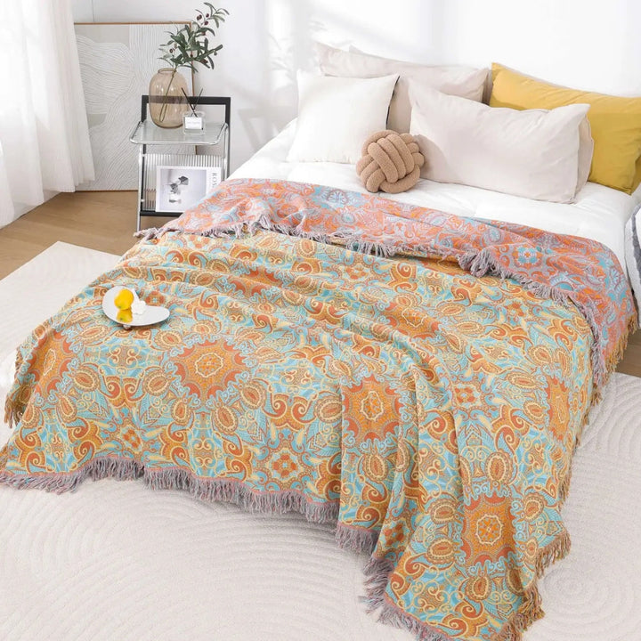 Wendbare Baumwolldecke mit Paisley-Muster und Quasten
