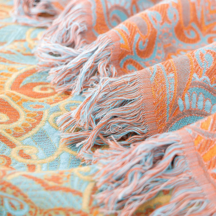 Wendbare Baumwolldecke mit Paisley-Muster und Quasten
