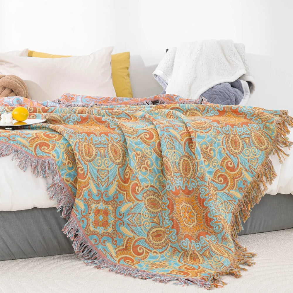 Wendbare Baumwolldecke mit Paisley-Muster und Quasten