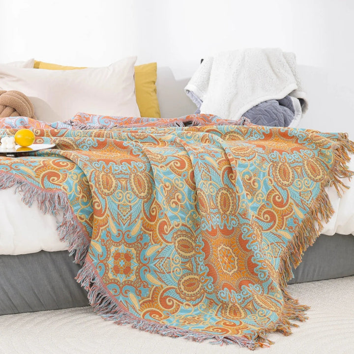 Wendbare Baumwolldecke mit Paisley-Muster und Quasten