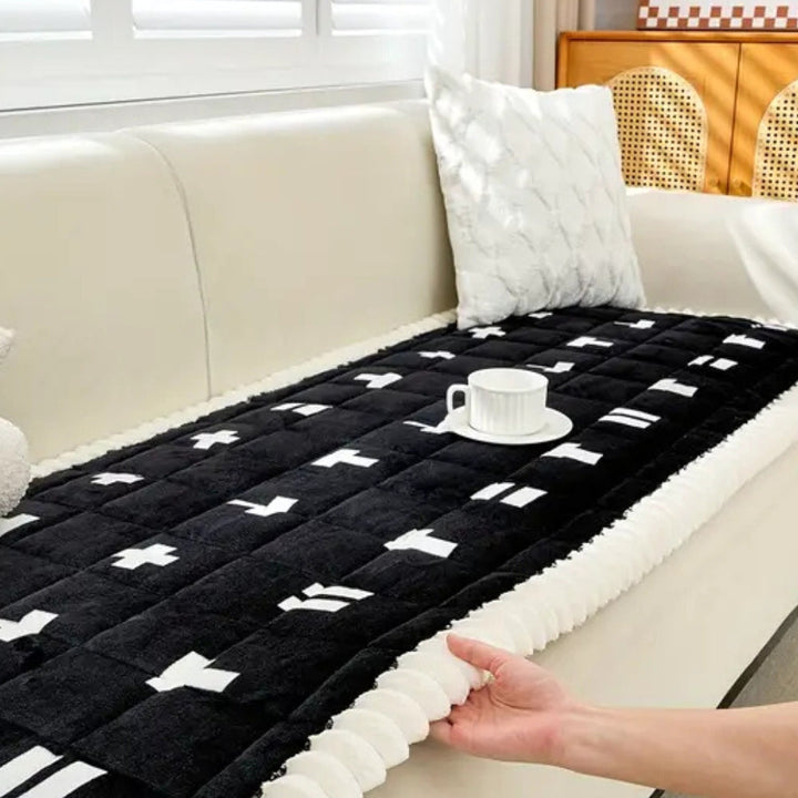 Sofaüberwurf gesteppt mit Rüschenkante