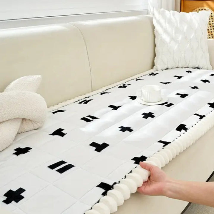 Sofaüberwurf gesteppt mit Rüschenkante