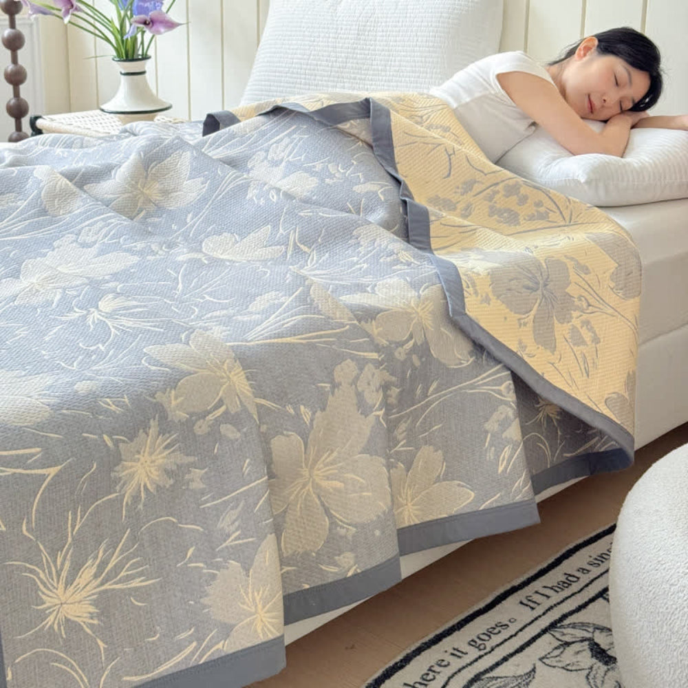 Wendbare Musselin-Baumwolldecke mit zartem Blumenmuster