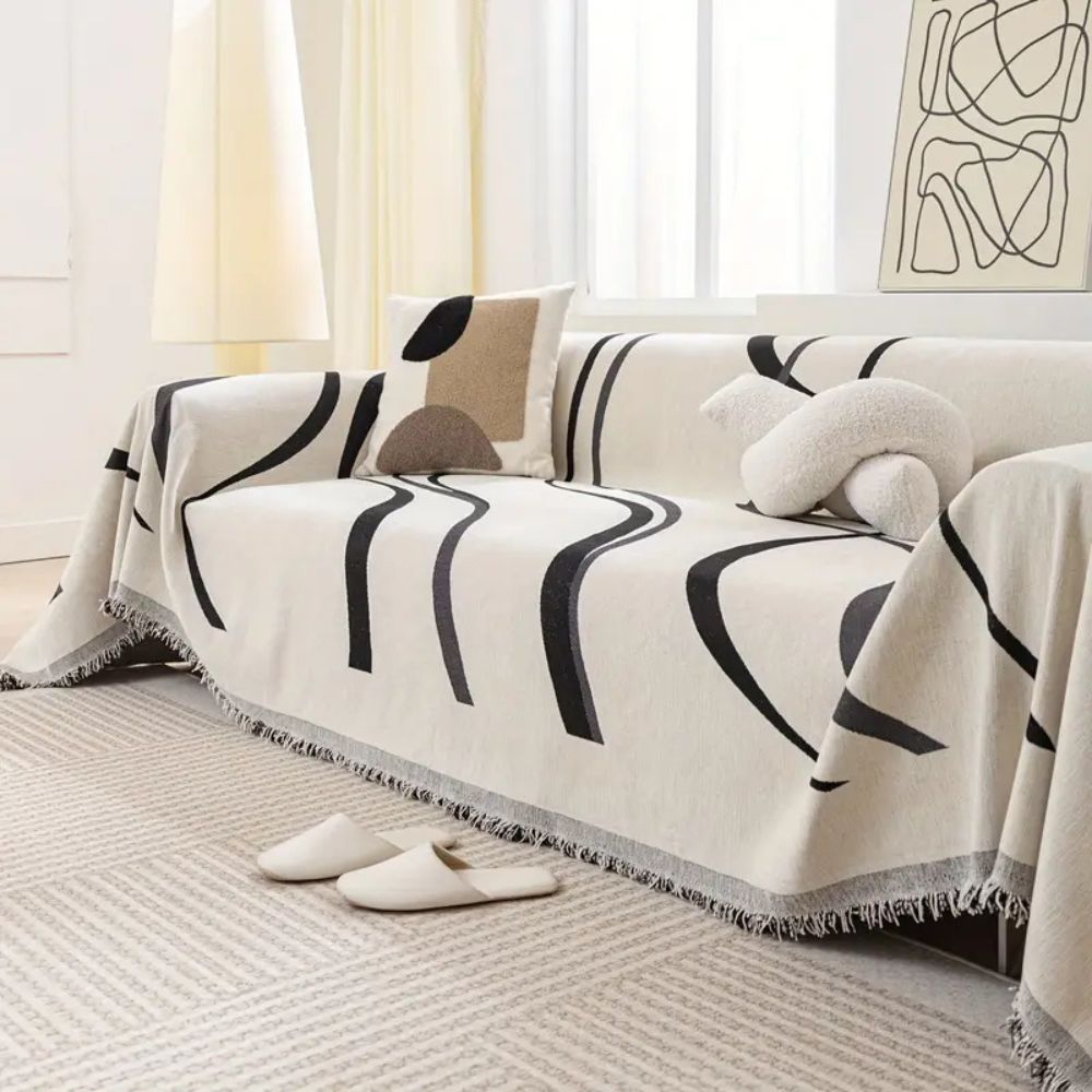 Sofaüberwurf Chenille Wellenlinien mit Quasten