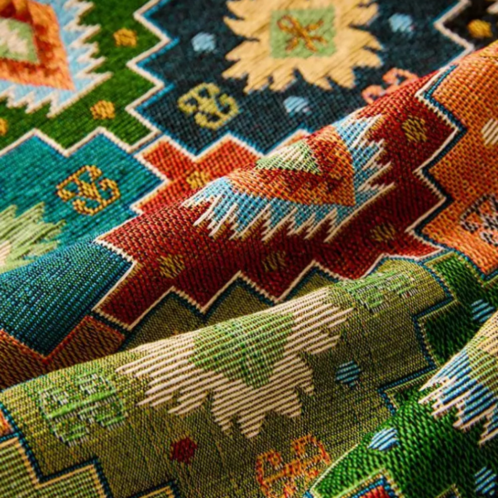 Jeté de canapé à motif kilim et glands