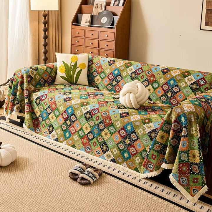 Jeté de canapé à motif kilim et glands