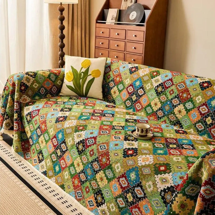 Jeté de canapé à motif kilim et glands