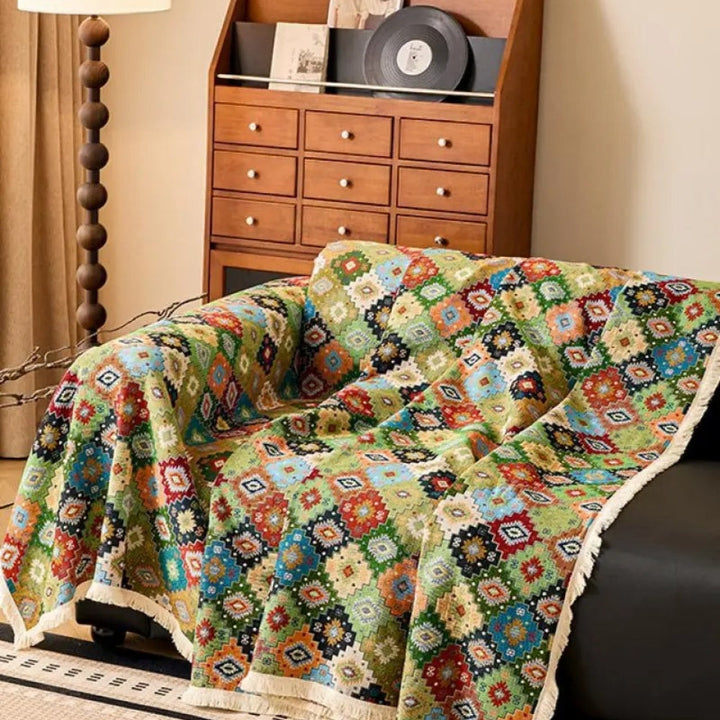 Jeté de canapé à motif kilim et glands