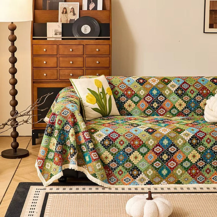 Jeté de canapé à motif kilim et glands