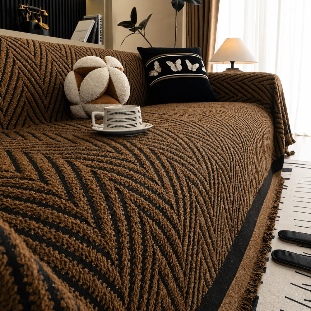Sofaüberwurf Boho Strick mit Quasten